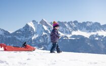 Kleinkind am Schlitteln | © Bergbahnen Flumserberg AG